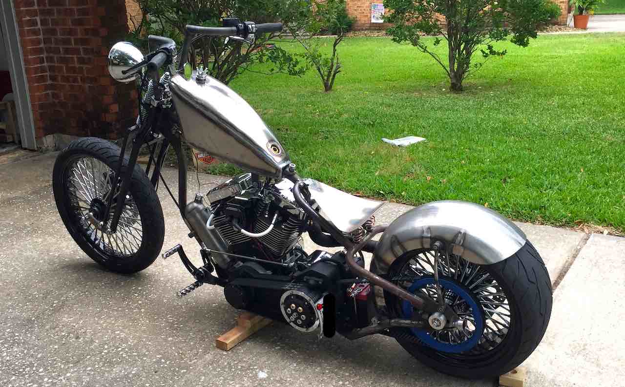 Harley custom chopper standing on a driveway