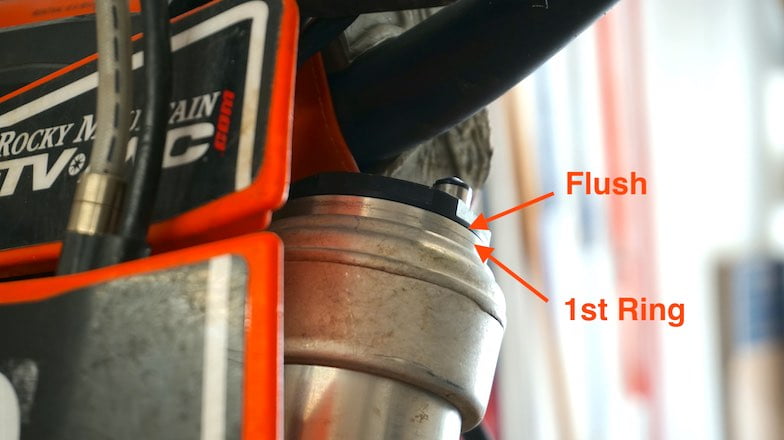 Adjusting front fork height on the triple trees will make dirt bike turn faster